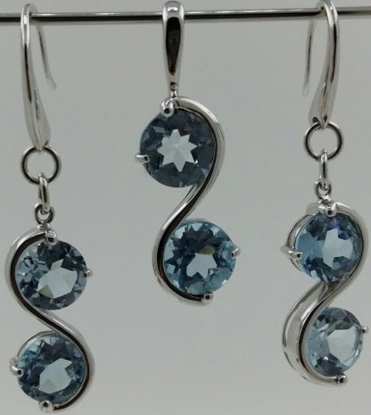 The Blue Topaz Collection Set With  .925 Sterling Silver.